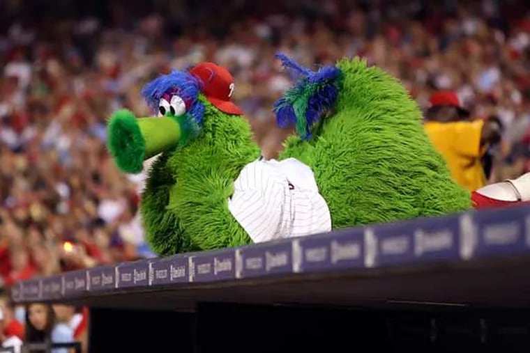 The Phanatic watches his team beat the Rockies.