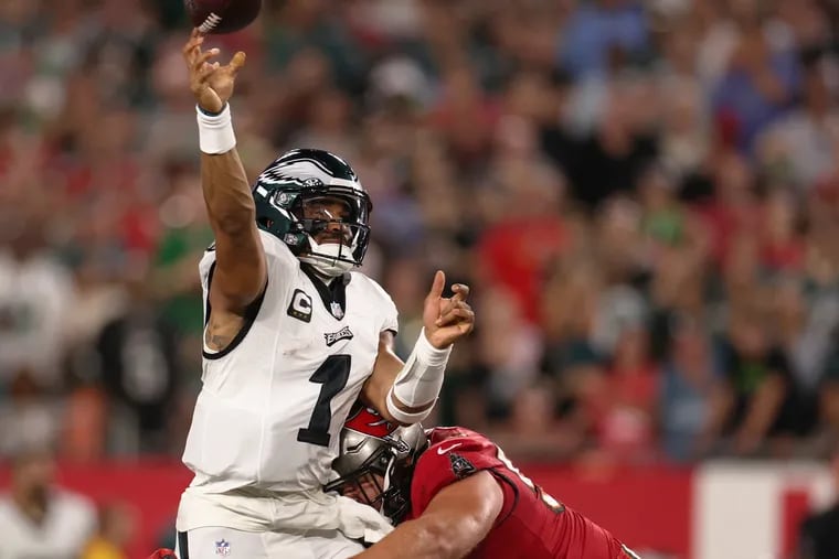 Philadelphia Eagles quarterback Jalen Hurts (1) throws to Philadelphia Eagles wide receiver Olamide Zaccheaus (13) for a touchdown in the second quarter of the game against the Tampa Bay Buccaneers in Tampa, Fla., on Monday, Sept. 25, 2023.