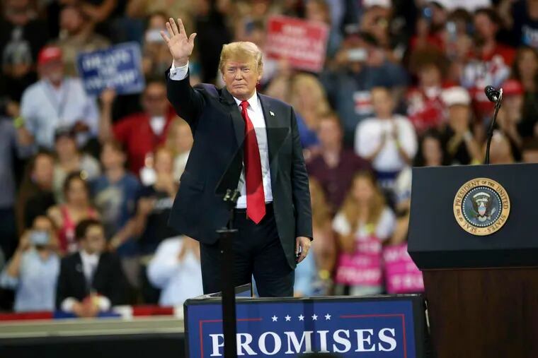 In this June 20, 2018 file photo, U.S. President Donald Trump waves to the crowd after speaking at a campaign rally, Wednesday, June 20, 2018, in Duluth, Minn.