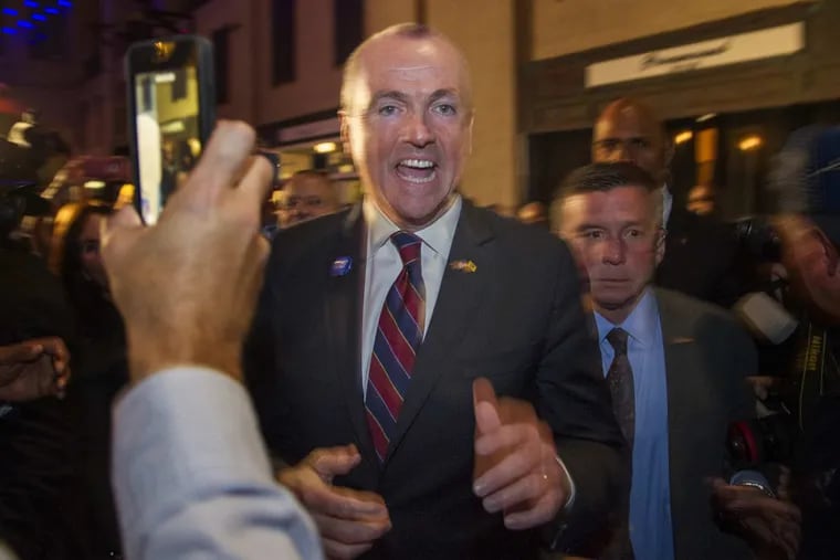 New Jersey Governor-elect Phil Murphy makes his way to the stage at his victory party at the Asbury Park Convention Hall Grand Arcade November 7, 2017.