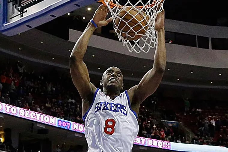 The 76ers' Damien Wilkins goes up for a dunk during the final minute. (Matt Slocum/AP)