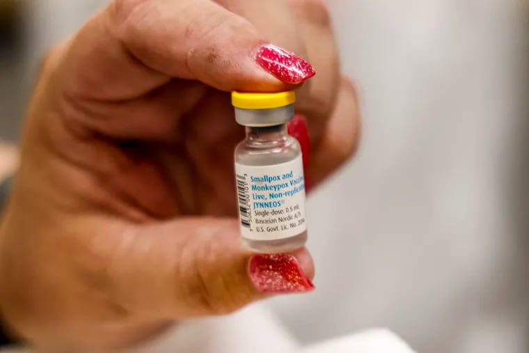 A nurse holds a vial containing the monkeypox vaccine at a vaccination clinic run by the Mecklenburg County Public Health Department in Charlotte, N.C., on Saturday.
