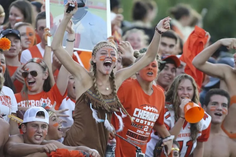 Cherokee High School fans cheer during a football game in 2016.