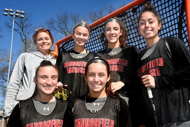 Starters with the Haddonfield girls' lacrosse team pose with head coach Jessica Blake (rear, left) at practice. Players, rear, from left: McKenzie Blake, Gabi Connor and Ashley Campo. Front, from left: Elise Fiannaca and Wayden Ay.