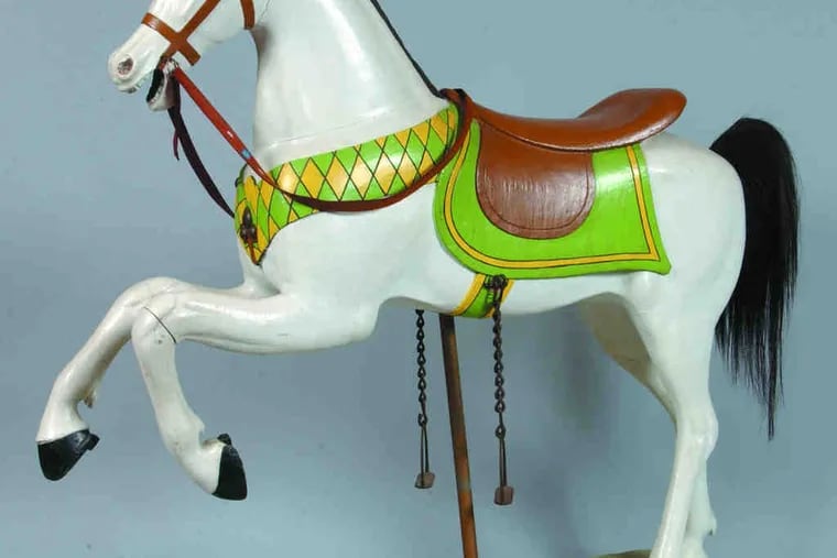 A carousel horse from the early 20th century is expected to fetch $2,000 to $3,000 Saturday at Conestoga. The sale stresses folk and primitive art; most other items should be less costly.