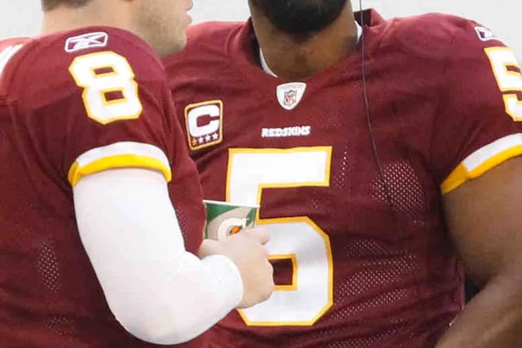 Rex Grossman (8) is the Redskins' QB now. Donovan McNabb is benched.