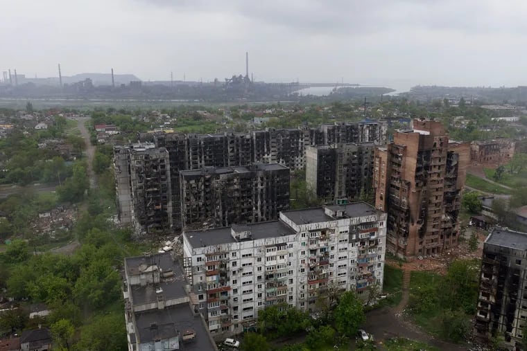 An aerial view of damaged residential buildings and the Azovstal steel plant in the background in the port city of Mariupol on Wednesday.