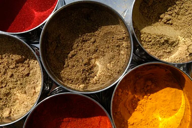 The essential spices: cumin, garam masala, coriander, chili powder, and turmeric. (MICHAEL S. WIRTZ / Staff Photographer)