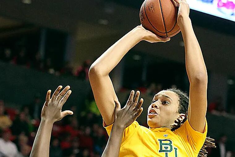 Brittney Griner set the Big 12 women's career scoring record, finishing with 40 points in top-ranked Baylor's 90-60 victory over Texas Tech. (Zach Long/AP)
