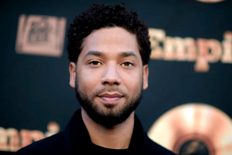 In this May 20, 2016 file photo, actor and singer Jussie Smollett attends the "Empire" FYC Event in Los Angeles. Chicago police say they're interviewing two "persons of interest" who surveillance photos show were in the downtown area where Smollett says he was attacked last month. A police spokesman said Thursday the two men aren't considered suspects but may have been in the area at the time Smollett says he was attacked. Smollett says two masked men shouted racial and homophobic slurs before beating him and putting a rope around his neck on Jan. 29.