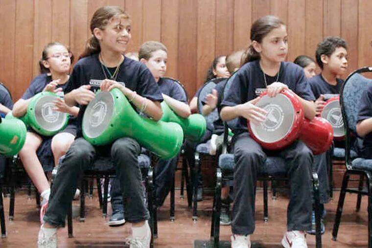 The Moffet School Drummers perform in a program conducted by Al Bustan Seeds of Culture.