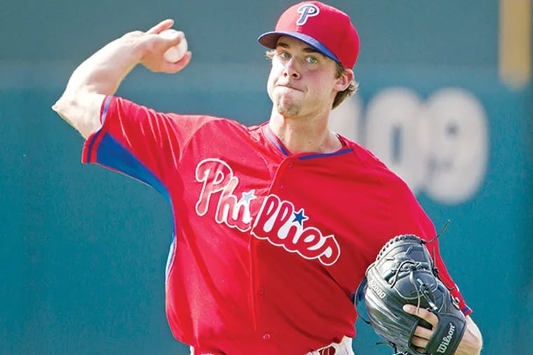 Aaron Nola of the Phillies does some long toss before the game on July 20, 2015. He is scheduled to make his first Major League start on July 21.