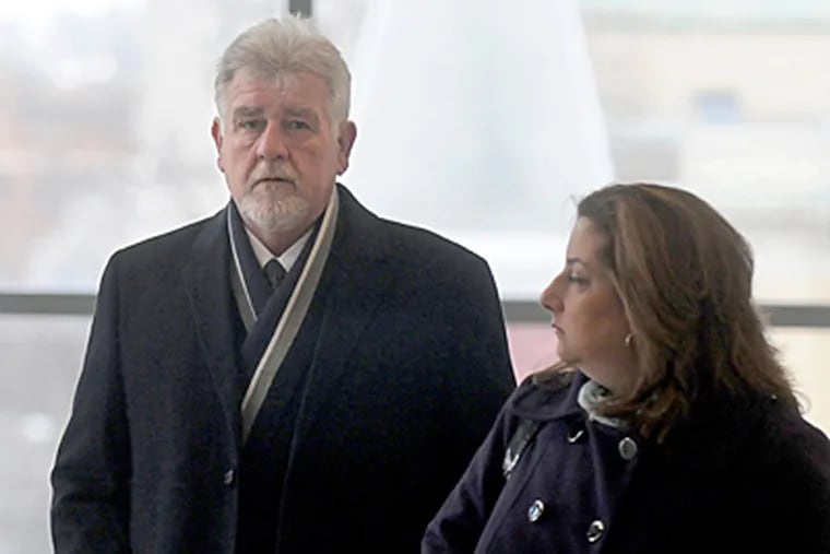 Acquitted driver John Tomaszewski and wife Valerie before the verdict. (DENNIS NETT / Syracuse (N.Y.) Post-Standard)