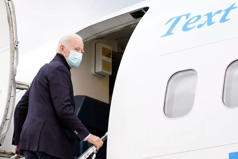 Democratic presidential candidate Joe Biden boards his campaign plane in Grand Rapids, Mich., on Friday.
