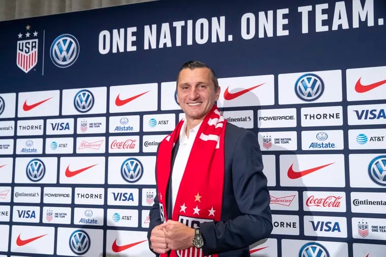 Vlatko Andonovski poses for photographers during a news conference where he was introduced as the new had coach of the U.S. women's soccer team.