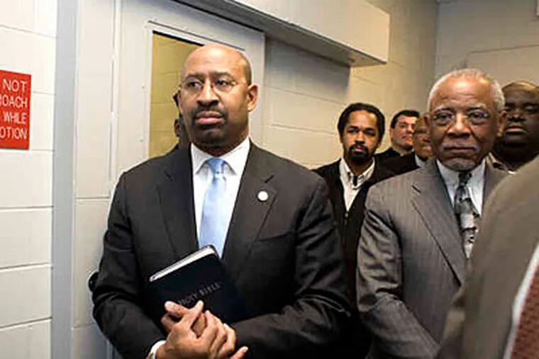 Mayor Nutter, former Mayor W. Wilson Goode (right), and clergymen arrive at the Curran-Fromhold Correctional Facility. (ED HILLE / Staff Photographer)