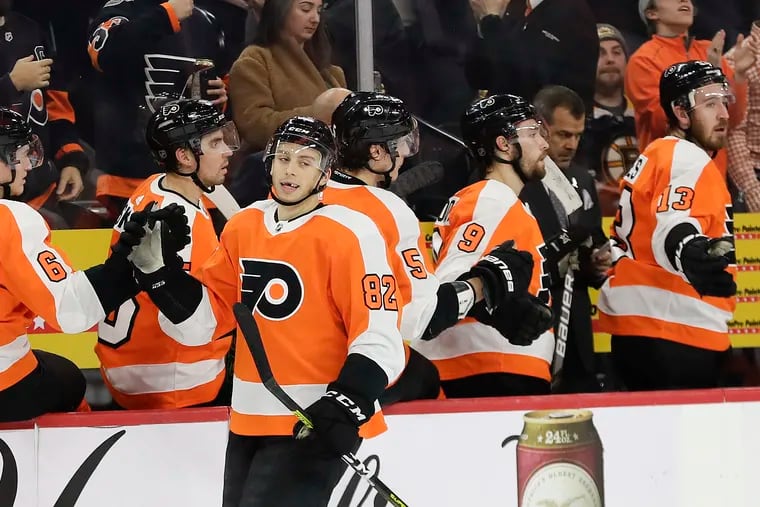 Flyers center Connor Bunnaman celebrates his second-period goal with his teammates Monday.