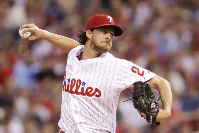 Phillies pitcher Aaron Nola throws a first-inning pitch against the New York Mets on Saturday.