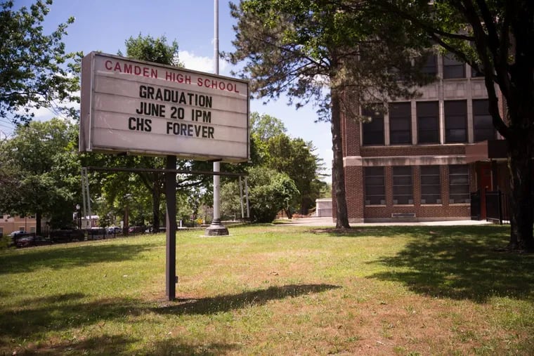 The sign outside Camden High School  celebrates its 2017 graduation ceremony, the last in the school’s old building. After more than 100 years in Camden’s Parkside neighborhood, “the Castle on the Hill” will be torn down this summer and be replaced with a state-funded, modern building.