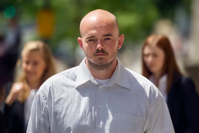 FILE - In this June 11, 2014, file photo, former Blackwater Worldwide guard Nicholas Slatten leaves federal court in Washington. Slatten has been convicted of murder at his third trial in the 2007 shooting of unarmed civilians in Iraq. (AP Photo/Cliff Owen, File)
