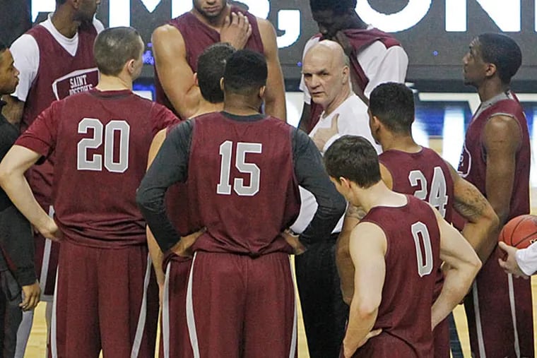 St. Joe's gathers for practice. (Ron Cortes/Staff Photographer)