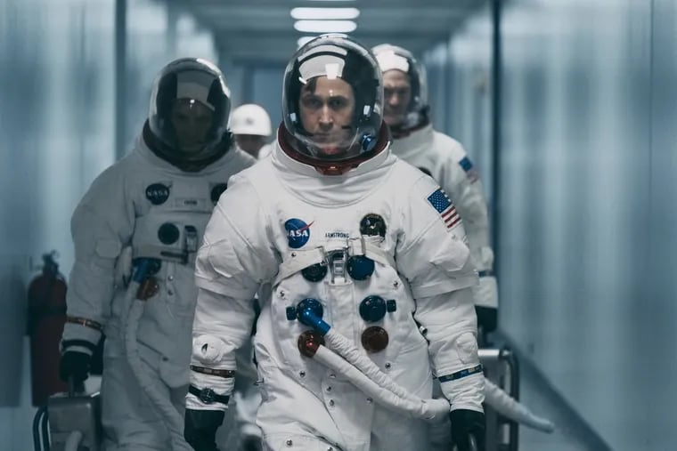 Lukas Haas, Ryan Gosling and Corey Stoll in the film 'First Man.'