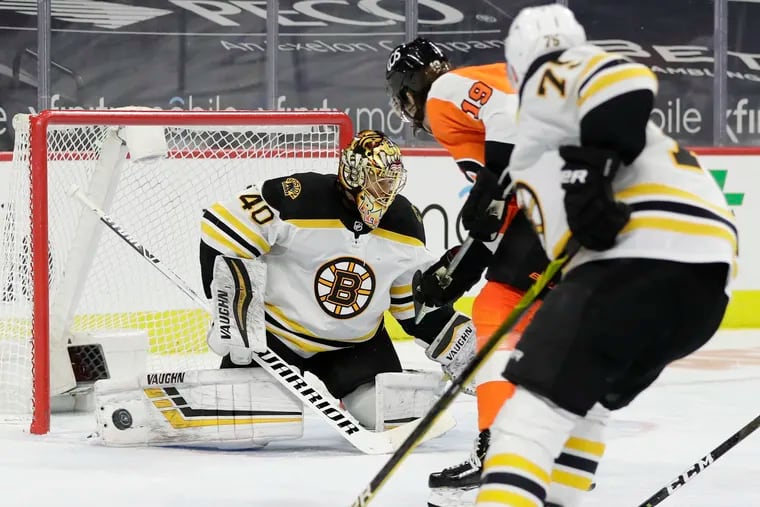 Boston Bruins goaltender Tuukka Rask stops Nolan Patrick's shot on Feb. 5. The Bruins scored two late goals to rally past the Flyers, 2-1.