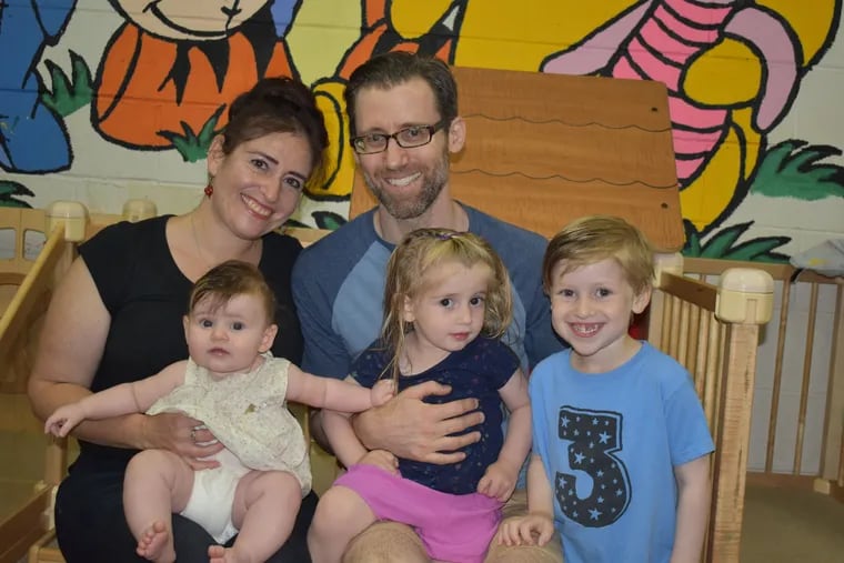 Hillary and Seth with children Kira, Eva and Raphael.