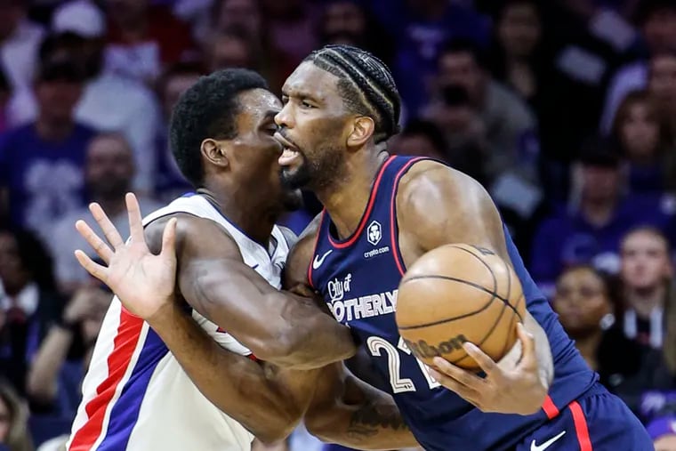 Sixers Joel Embiid collides with Pistons Jalen Duren during the 1st quarter at the Wells Fargo Center in Philadelphia, Tuesday, April 9, 2024.