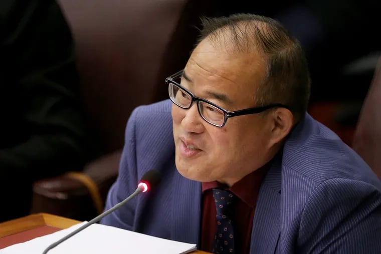 City Councilman David Oh sits during a City Council meeting at City Hall in Philadelphia in 2019.