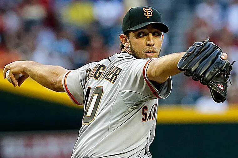 The Phillies will face 23-year-old lefthander Madison Bumgarner, who is off to a sizzling start. (Matt York/AP)