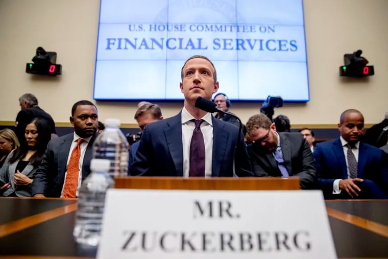 In this Oct. 23, 2019 photo, Facebook CEO Mark Zuckerberg arrives for a House Financial Services Committee hearing on Capitol Hill in Washington. Zuckerberg’s social network in Washington is shrinking. Democrats especially are homing in on the conduct of the social media giant and its refusal to fact-check political ads and remove false ones.