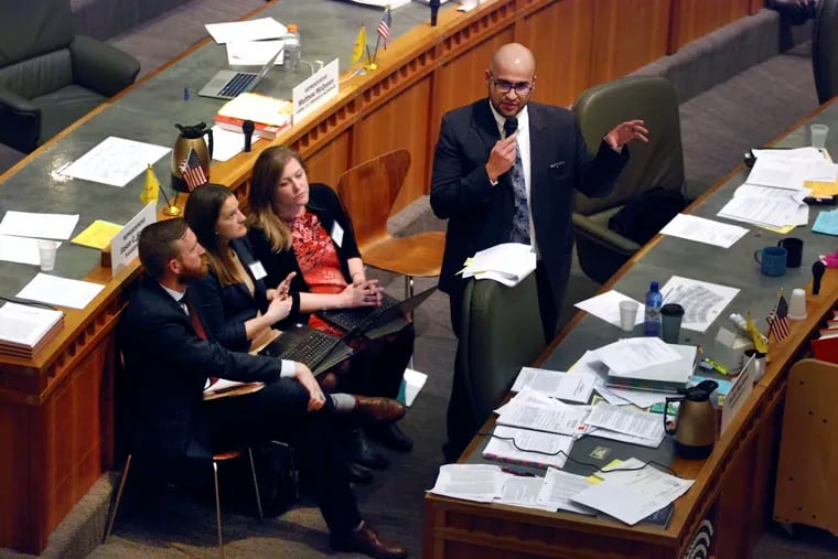 In this Thursday, March 7, 2019 photo, New Mexico State Rep. Javier Martinez of Albuquerque (right) rallies support for a bill to authorize recreational marijuana consumption and sales through state-owned stores in Santa Fe, N.M. New Mexico took a step toward legalizing recreational marijuana when its House approved a bill that would allow state-run stores and require customers to carry a receipt with their cannabis or face penalties. The measure, narrowly approved Thursday, March 7, 2019, following a late-night floor debate, mixes major provisions of a Republican-backed Senate bill that emphasizes aggressive regulation with a draft by Democrats concerned about the U.S. war on drugs.