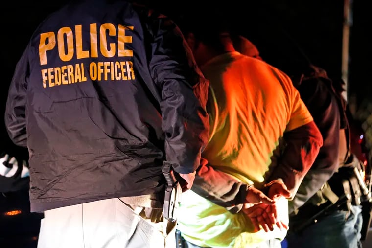 Last year, during a raid in Richmond, Va., federal Immigration and Customs Enforcement agents surrounded and detained a person during a removal operation. Carrying out President Trump's hard-line immigration policies has exposed ICE to public scrutiny and criticism.