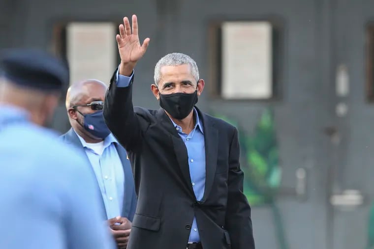 Former President Obama waves to Biden Supporters after he made an unannounced stop at the Hank Gathers Youth Access Center in the Strawberry Mansion section of North Philadelphia. He met with community organizers in an event organized by State Sen. Sharif Street (D.,Phila.).Wednesday, October 21, 2020
