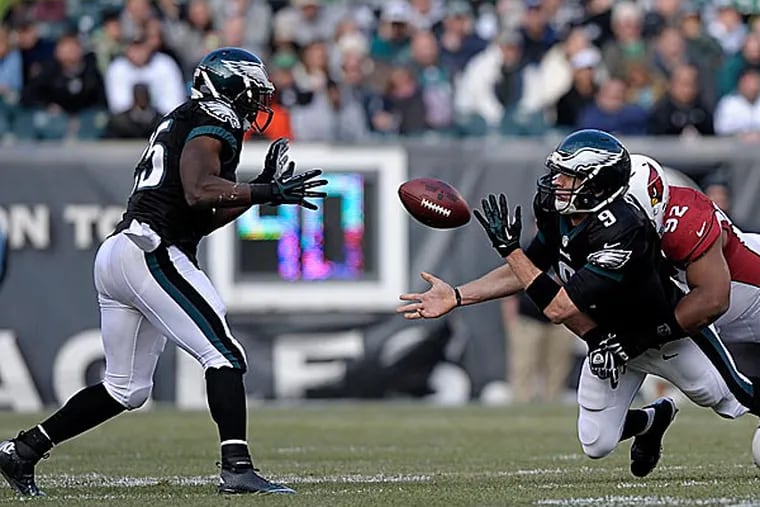 Eagles running back LeSean McCoy and quarterback Nick Foles. (Michael Perez/AP)