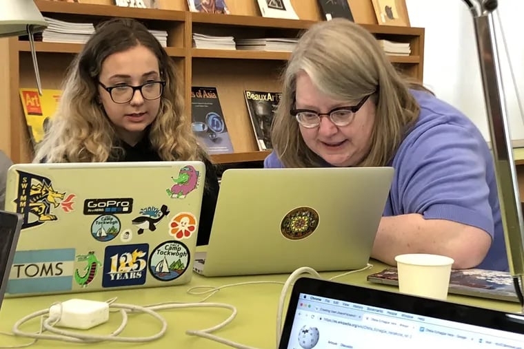 Wikipedian-in-residence at the Science History Institute, Mary Mark Ockerbloom (right), introduces one of Drexel's Spanish translation students to the editing software during the Edit-A-Thon, at the Philadelphia Museum of Art's Library and Archives at the Perelman Building. March 2, 2019.