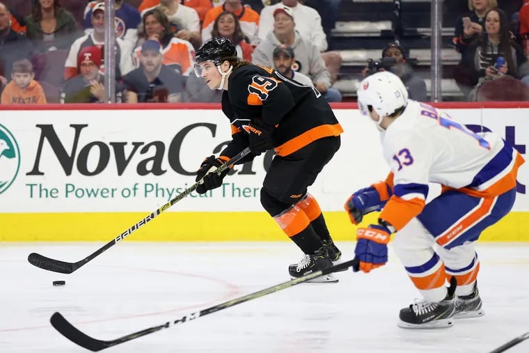 Flyers' center Nolan Patrick (19) skates the puck past the Islanders' Mathew Barzal during a game at the Wells Fargo Center late last season.