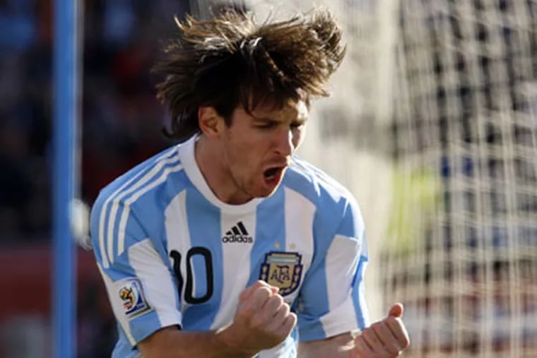 Lionel Messi and Argentina face Germany on Saturday morning. (AP Photo / Ricardo Mazalan)