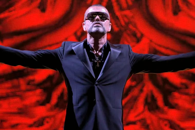 George Michael at a benefit concert in Paris in 2012 to raise money for the AIDS charity Sidaction.