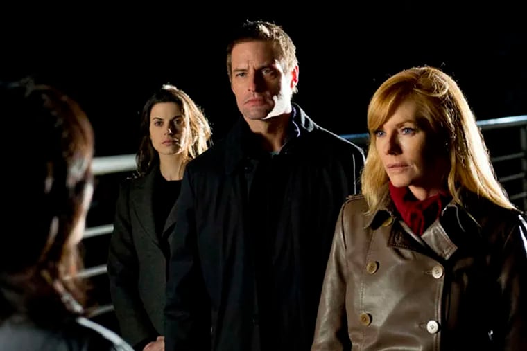 Josh Holloway (center) is a smart, tough U.S. agent working for Marg Helgenberger (right) and watched by the Secret Service's Meghan Ory (left).