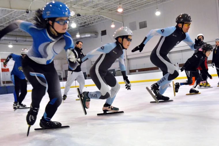 Instructor Kyle Carr ,back L, leads drills during a class of the East Penn Speedskating Club at the Body Zone in Reading Pa. on Sunday January 21,2018. Mark C Psoras/For the Inquirer