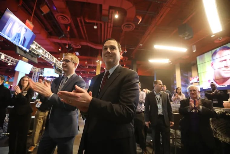 Christopher Albrecht, general manager of Harrah's Philadelphia Casino and Racetrack, applauds as the casino becomes the sixth Pennsylvania outlet to launch sports betting on Tuesday.