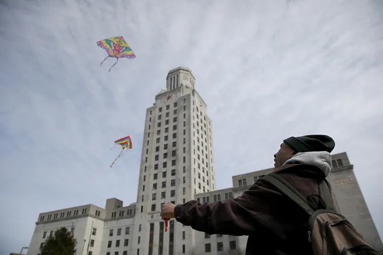 Robert Parker, 64, of Camden, NJ, flies a kite in Roosevelt Plaza Park in front of Camden County City Hall in Camden, NJ on March 13, 2019. Parker said it was the first time he has ever flown a kite.