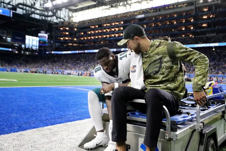 Philadelphia Eagles wide receiver Jalen Reagor (18) is carted off in the first quarter of the game Sunday, October 31, 2021 at Ford Field in Detroit, Michigan.