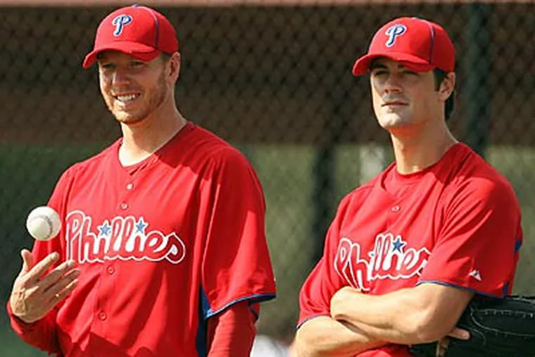 Roy Halladay and Cole Hamels are just two pieces in a dangerous Phillies' rotation. (Yong Kim/Staff Photographer)