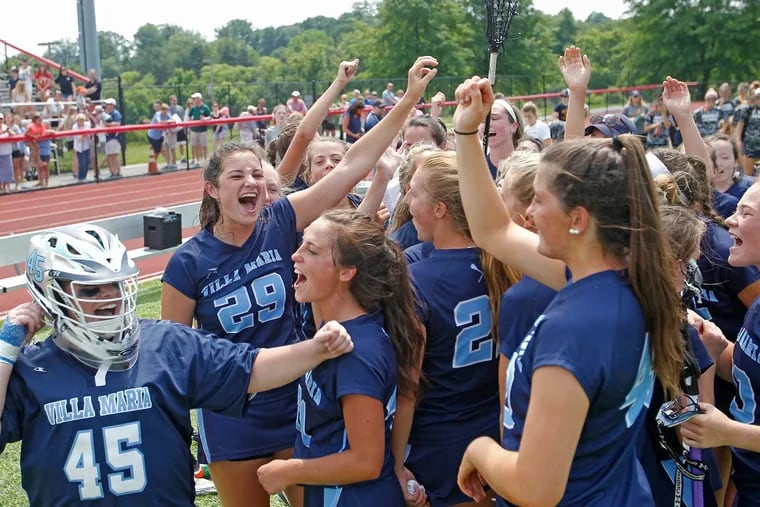 Villa Maria players celebrate after the Hurricanes won the PIAA Class 2A girls' lacrosse championship with a 17-5 victory over Kennard-Dale on Saturday, June 9, 2018, at West Chester East.