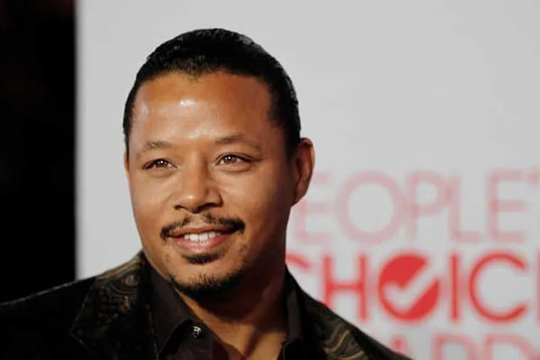 Terrence Howard arrives at the People's Choice Awards on Wednesday, Jan. 11, 2012 in Los Angeles. (AP Photo/Matt Sayles)