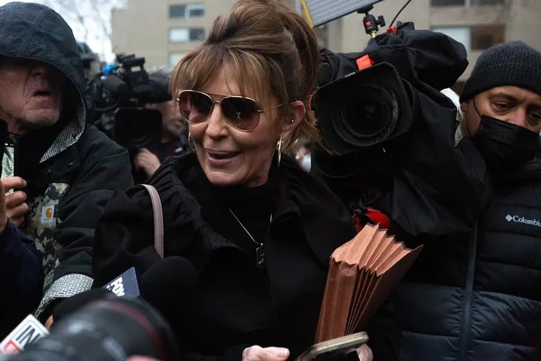 Former Alaska Gov. Sarah Palin outside federal court in New York in February. Palin is running to fill Alaska's U.S. Congress seat.