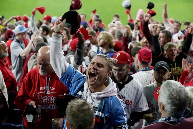Fans following the singing of God Bless Ameica during Game 3 of the World Series between the Phillies and Astros at Citizens Bank Park on Nov. 1, 2022.
